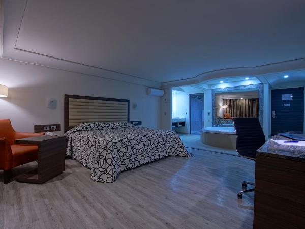 Econo Express Hotel : photo 3 de la chambre suite deluxe avec baignoire spa