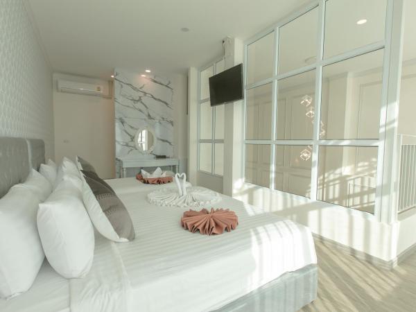 De Hug Hotel & Residence : photo 10 de la chambre suite duplex familiale