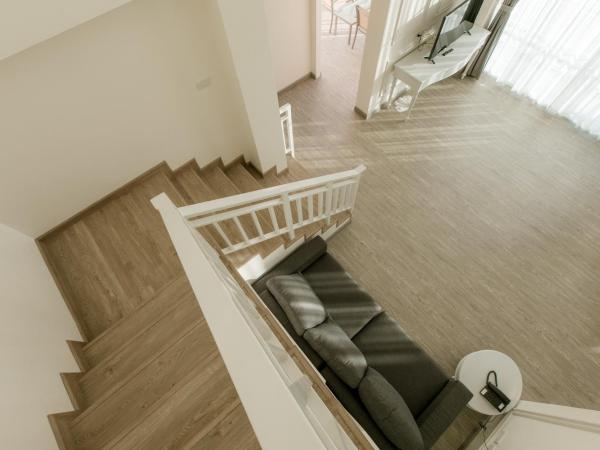 De Hug Hotel & Residence : photo 4 de la chambre suite duplex familiale