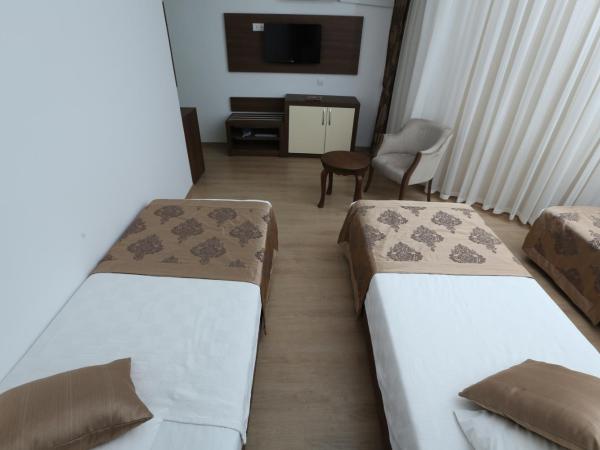 Olbia Hotel : photo 2 de la chambre chambre double ou lits jumeaux standard avec vue partielle sur mer
