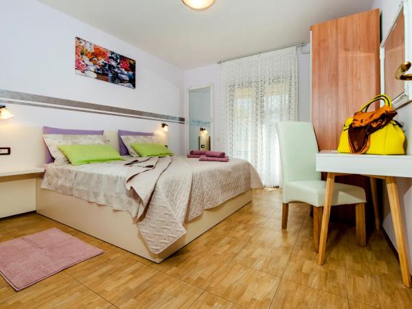 Apartments and Rooms Villa Dea ADULTS ONLY : photo 1 de la chambre appartement 1 chambre confort avec terrasse - vue sur jardin