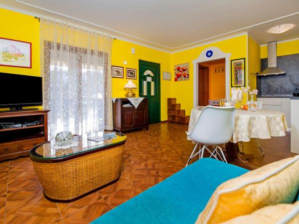 Apartments and Rooms Villa Dea ADULTS ONLY : photo 5 de la chambre appartement supérieur 1 chambre avec terrasse - vue sur jardin