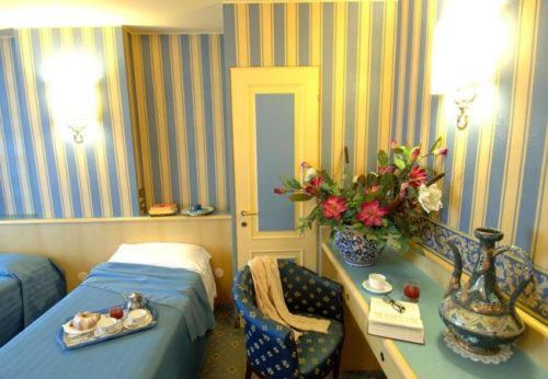 Hotel Garda : photo 8 de la chambre chambre triple