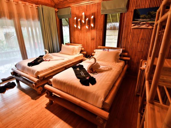 Phi Phi CoCo Beach Resort - SHA Extra Plus : photo 1 de la chambre chambre lits jumeaux - jardin
