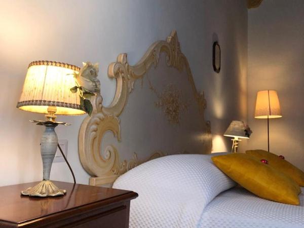 BnB Paolina : photo 6 de la chambre chambre lit king-size - vue sur jardin