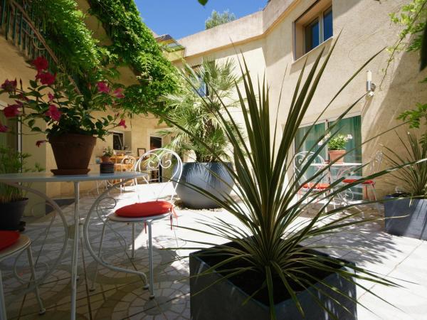 Couette et Café : photo 4 de la chambre chambre triple - vue sur jardin