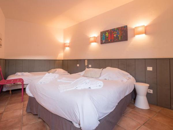 L'Île Ô Château : photo 1 de la chambre chambre triple