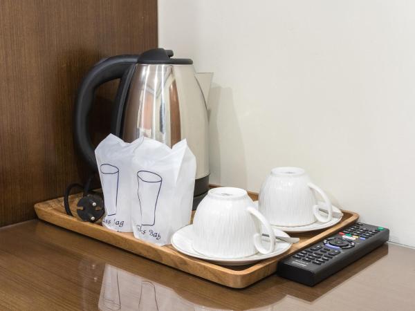 Suthep Home & Hostel : photo 8 de la chambre chambre lit king-size deluxe