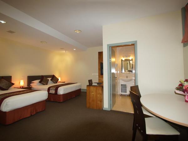 Twin Towers Inn : photo 3 de la chambre chambre lits jumeaux Économique