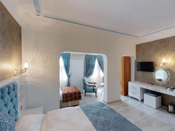 Urcu Hotel : photo 1 de la chambre chambre deluxe - vue sur ville