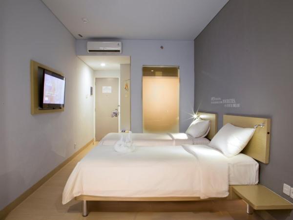 Kyriad Fatmawati Jakarta : photo 6 de la chambre grande chambre deluxe lits jumeaux