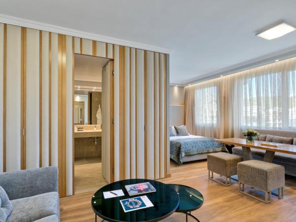 Divani Caravel : photo 1 de la chambre suite familiale divine (2 adultes + 2 enfants)