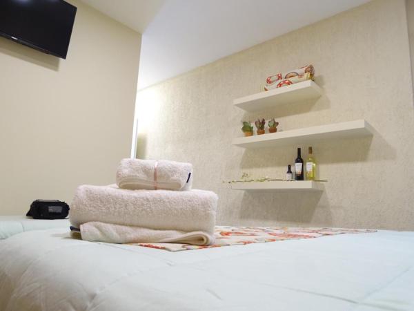 Giova Apart Salta : photo 2 de la chambre chambre triple classique