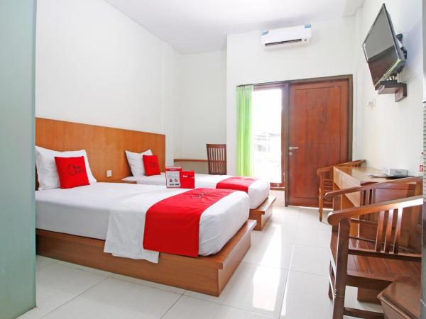 RedDoorz @ Turangga Sari : photo 3 de la chambre chambre lits jumeaux