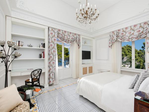 Luxury Villa Excelsior Parco : photo 1 de la chambre chambre double ou lits jumeaux exécutive avec terrasse