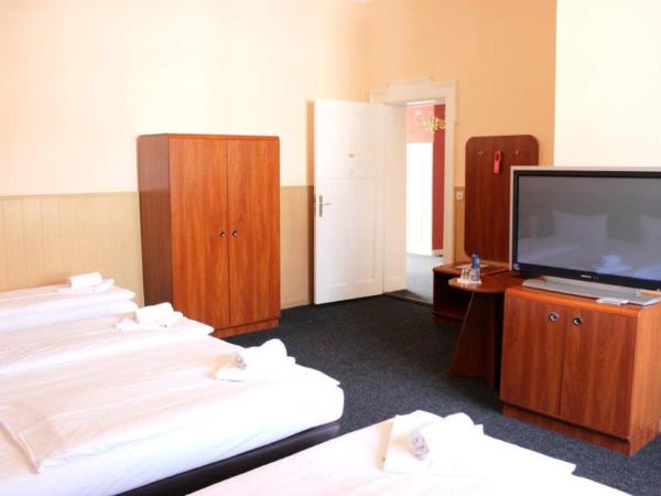 Hotel-Pension Rheingold am Kurfürstendamm : photo 3 de la chambre chambre quadruple