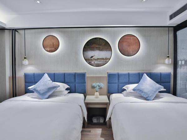 SSAW Boutique Hotel Hangzhou Ant Z-space : photo 6 de la chambre chambre double avec 2 lits doubles
