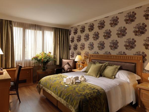 Divani Caravel : photo 1 de la chambre suite familiale (2 adultes + 2 enfants)