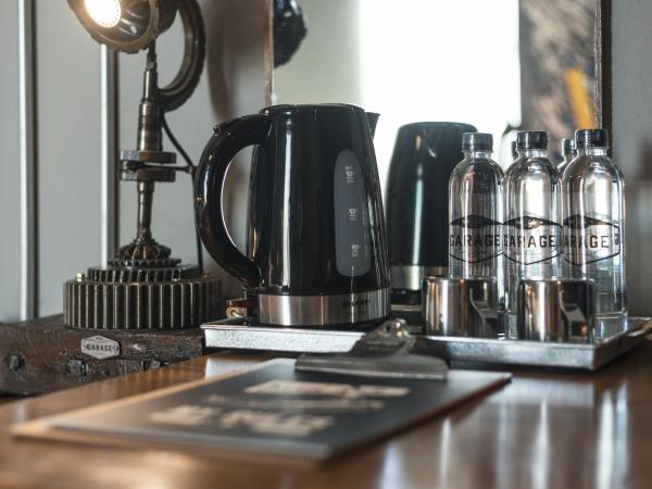 Mestyle Garage Hotel : photo 3 de la chambre chambre triple supérieure