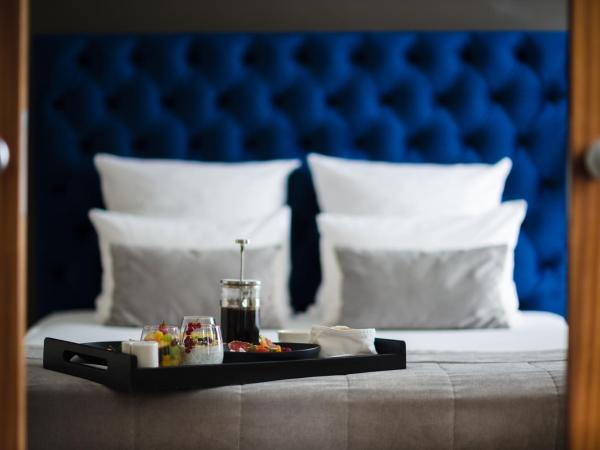 Mercure Lublin Centrum : photo 4 de la chambre suite lit double avec canapé