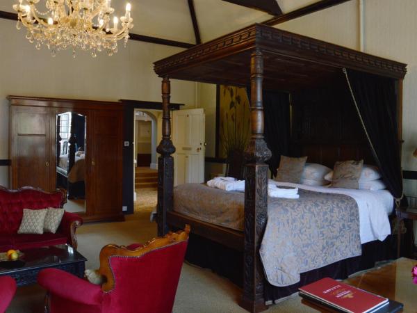 Langtry Manor Hotel : photo 2 de la chambre suite lit king-size avec balcon
