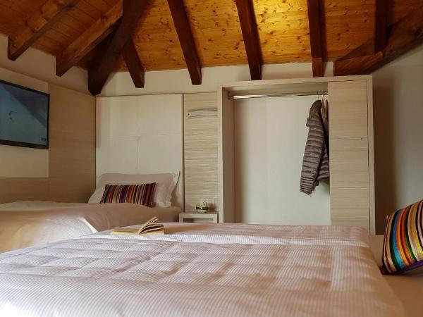 @ Home Hotel Locarno : photo 5 de la chambre chambre triple - vue sur lac