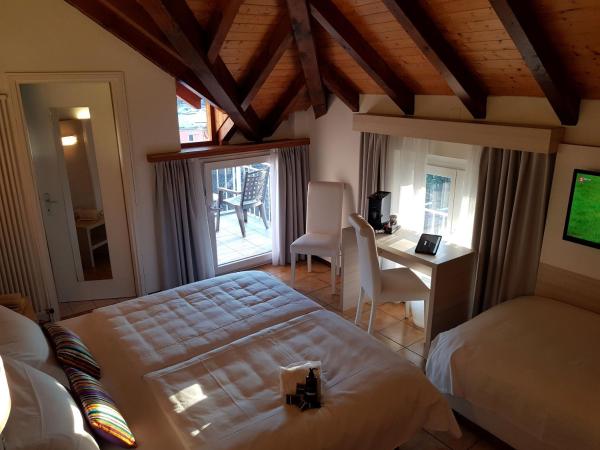 @ Home Hotel Locarno : photo 4 de la chambre chambre triple - vue sur lac