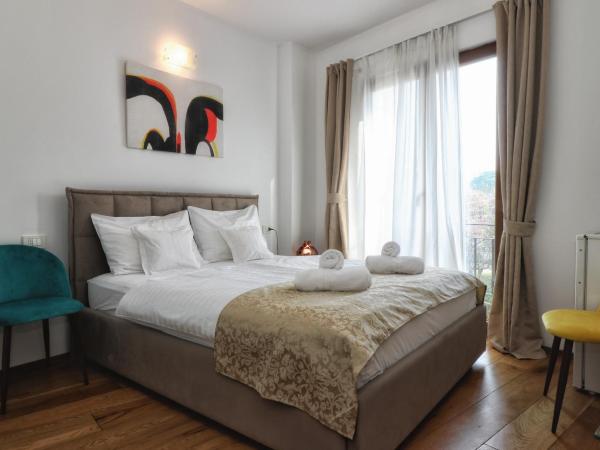 Kseni Accommodation : photo 1 de la chambre chambre double - vue sur jardin