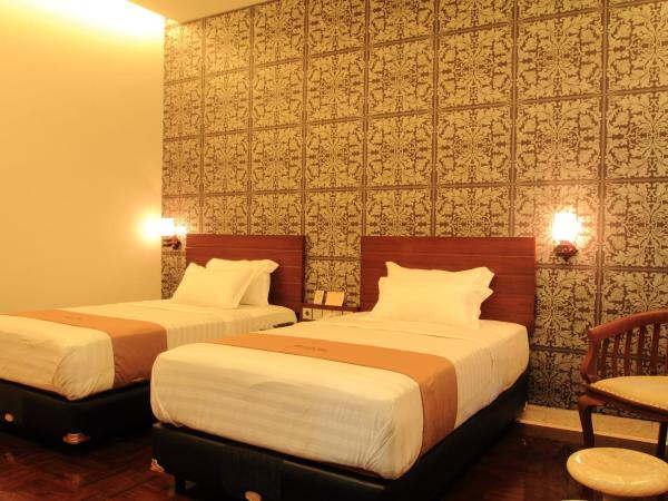 Omah Qu Guesthouse Malioboro : photo 8 de la chambre chambre lits jumeaux deluxe