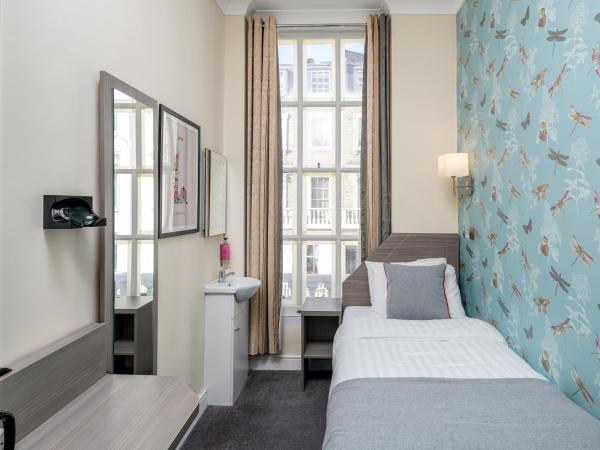 OYO Bakers Hotel London Victoria : photo 1 de la chambre chambre simple avec salle de bains extérieure privative