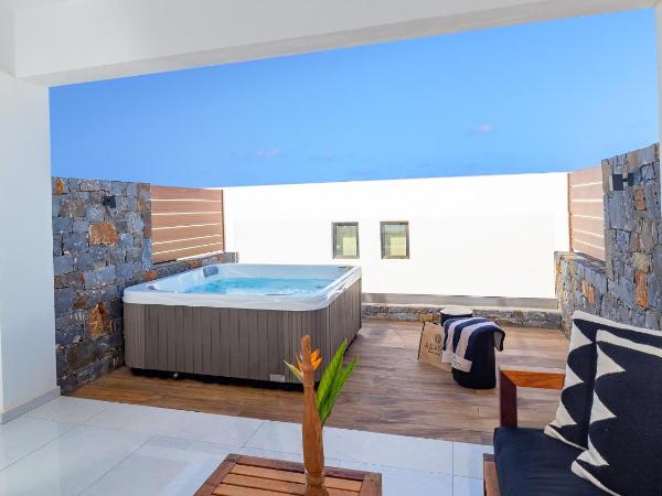 Abaton Island Resort & Spa : photo 5 de la chambre suite collection abaton avec baignoire spa privée