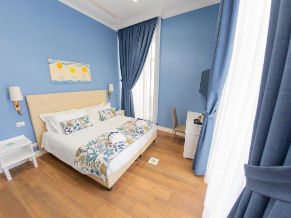 Suite CuoreNapoletano : photo 9 de la chambre chambre double ou lits jumeaux deluxe avec balcon