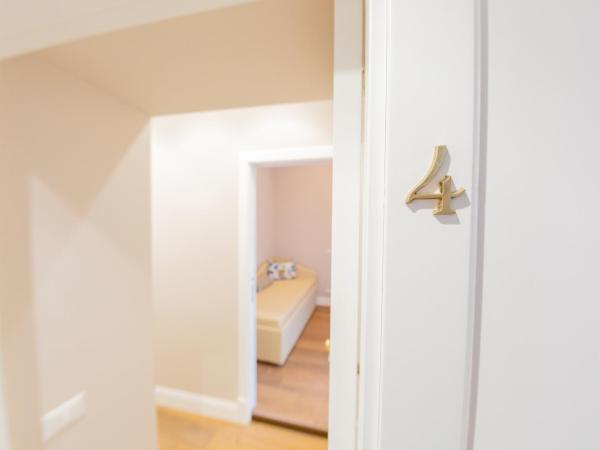 Suite CuoreNapoletano : photo 10 de la chambre chambre familiale standard