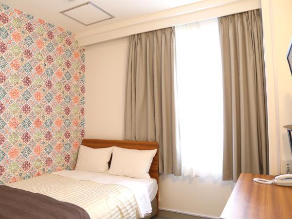 Tokyo Ueno New Izu Hotel : photo 1 de la chambre chambre double avec petit lit double - non-fumeurs