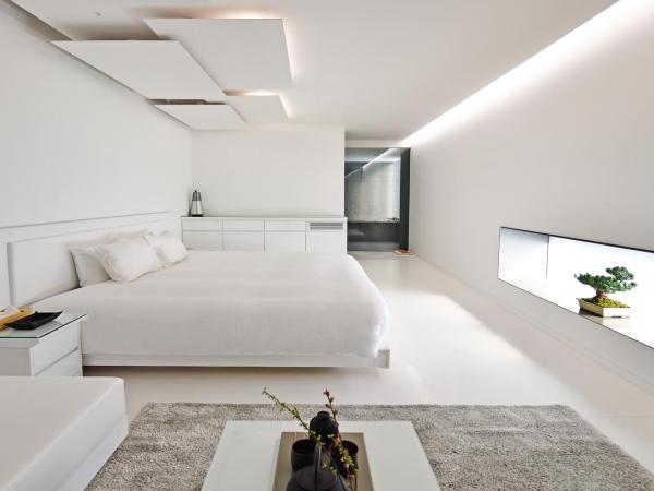 MOGANA : photo 4 de la chambre chambre double deluxe blanche - vue sur jardin