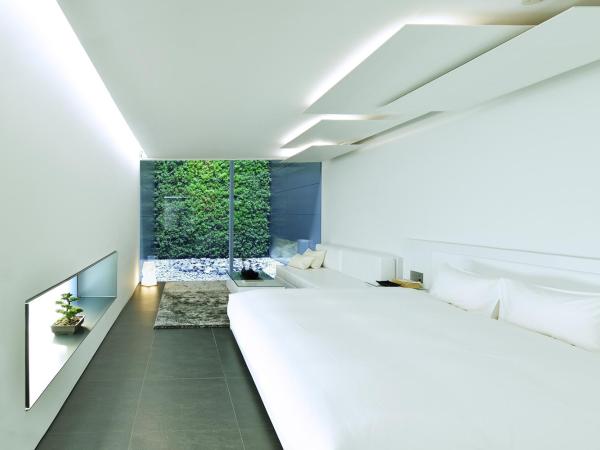 MOGANA : photo 6 de la chambre chambre double deluxe - vue sur jardin