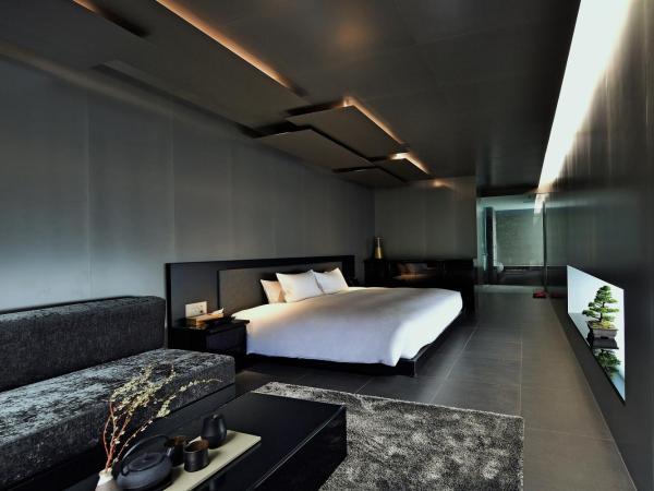 MOGANA : photo 4 de la chambre chambre double deluxe noire - vue sur jardin