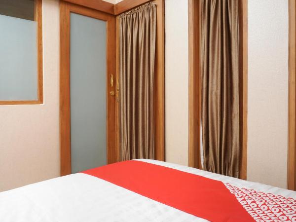 Super OYO 444 Rafitha Homestay : photo 4 de la chambre chambre double standard
