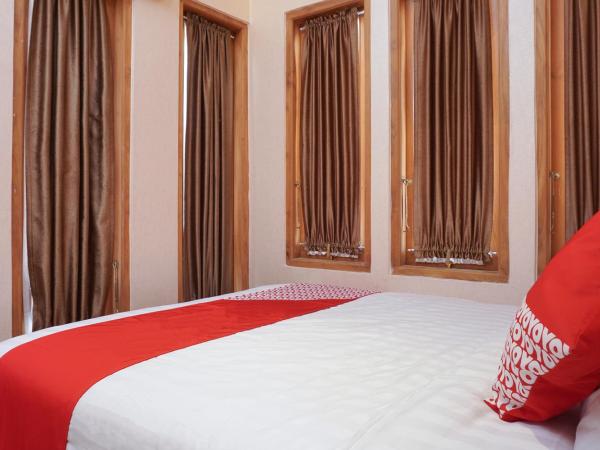 Super OYO 444 Rafitha Homestay : photo 5 de la chambre chambre double standard