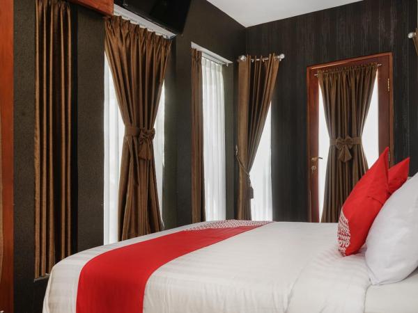 Super OYO 444 Rafitha Homestay : photo 5 de la chambre chambre double deluxe