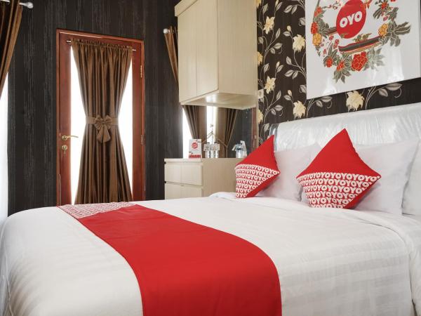 Super OYO 444 Rafitha Homestay : photo 1 de la chambre chambre double deluxe