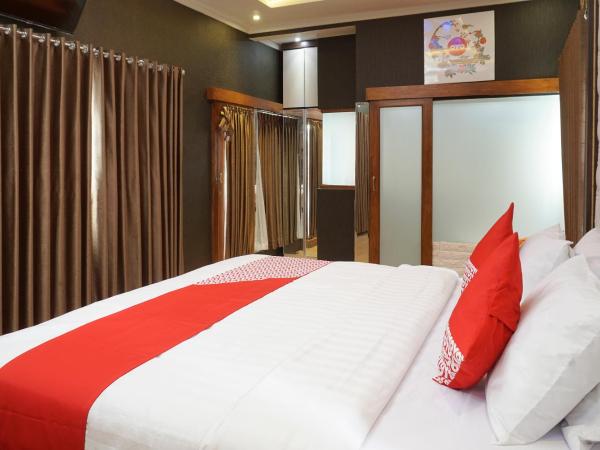 Super OYO 444 Rafitha Homestay : photo 7 de la chambre suite deluxe