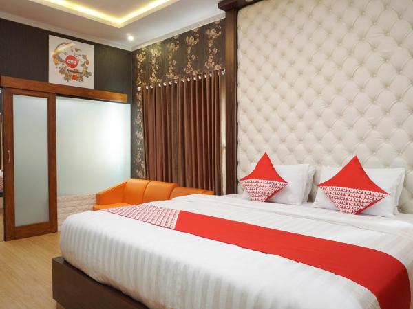 Super OYO 444 Rafitha Homestay : photo 8 de la chambre suite deluxe