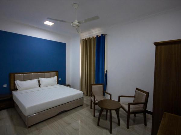 Home Station Hotel : photo 5 de la chambre suite deluxe avec lit king-size