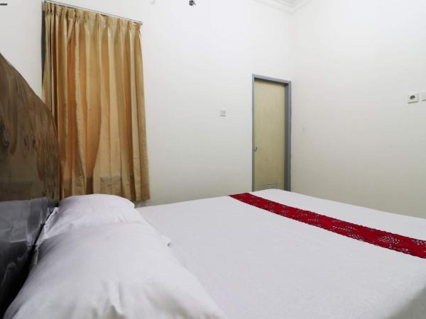 Wisma Lamida 2 Syariah : photo 2 de la chambre chambre double deluxe