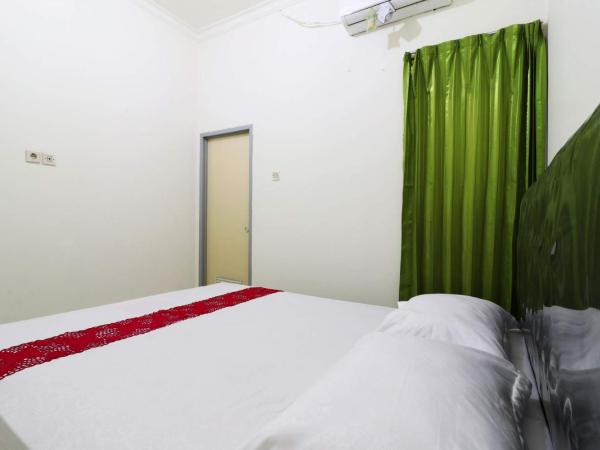 Wisma Lamida 2 Syariah : photo 7 de la chambre chambre double deluxe