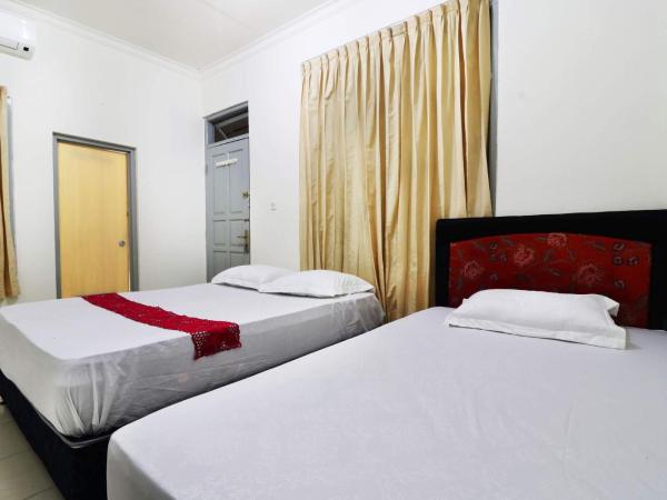 Wisma Lamida 2 Syariah : photo 2 de la chambre chambre familiale