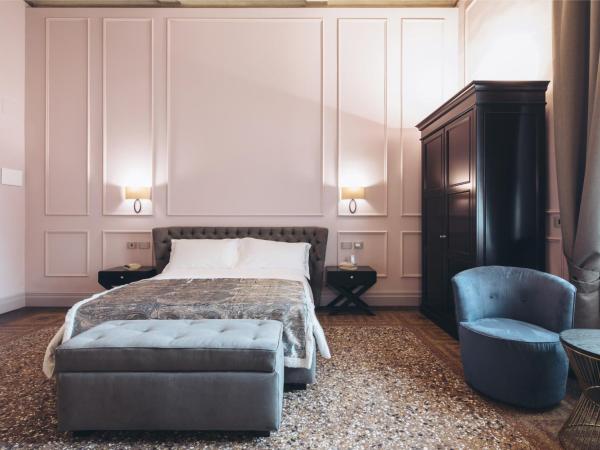 Gregorini Bingham Art Luxury Suites : photo 4 de la chambre suite deluxe avec lit king-size