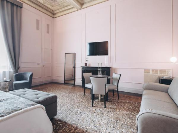 Gregorini Bingham Art Luxury Suites : photo 8 de la chambre suite deluxe avec lit king-size