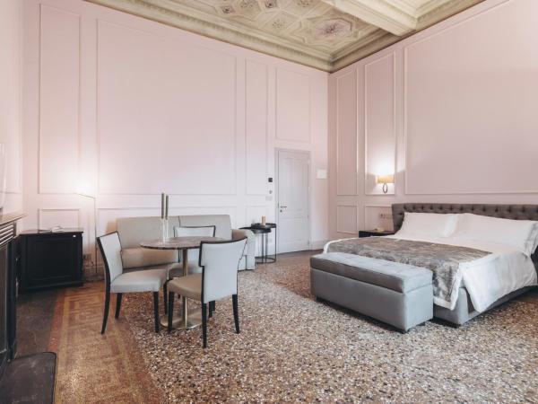 Gregorini Bingham Art Luxury Suites : photo 1 de la chambre suite deluxe avec lit king-size